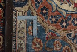 Backside of handmade 1970s Kashmar rug showing knot structure and weave density