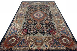 Surface texture of 1970s Kashmar rug with natural Wool and intricate pattern