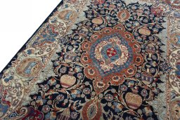 Backside of handmade 1970s Kashmar rug showing knot structure and weave density