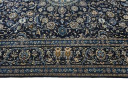 Corner detail of 2000s Kashmar rug showing border pattern and Wool pile