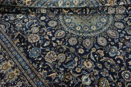 Close-up detail of 2000s Kashmar rug from Iran / Persia showing Wool weave