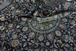 Surface texture of 2000s Kashmar rug with natural Wool and intricate pattern