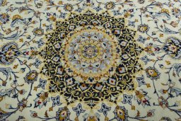 Central medallion detail of 2000s Kashmar rug from Iran / Persia