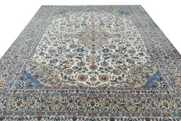 Surface texture of 2000s Kashmar rug with natural Wool and intricate pattern