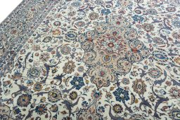 Backside of handmade 2000s Kashmar rug showing knot structure and weave density