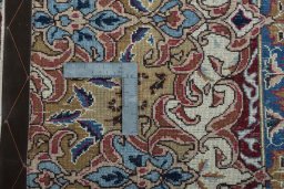Backside of handmade 1970s Kashmar rug showing knot structure and weave density