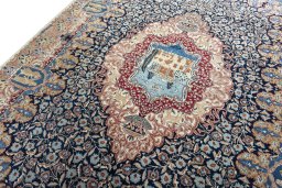 Backside of handmade 1970s Kashmar rug showing knot structure and weave density