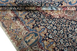 Close-up detail of 1970s Kashmar rug from Iran / Persia showing Wool weave