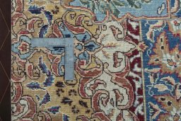 Backside of handmade 1970s Kashmar rug showing knot structure and weave density