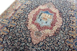 Backside of handmade 1970s Kashmar rug showing knot structure and weave density