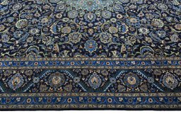 Corner detail of 2000s Kashmar rug showing border pattern and Wool pile