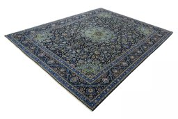 Corner detail of 2000s Kashmar rug showing border pattern and Wool pile