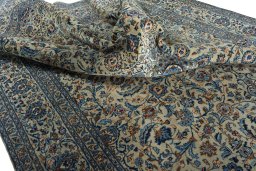 Surface texture of 2000s Kashmar rug with natural Wool and intricate pattern