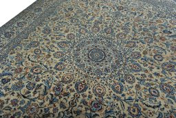 Backside of handmade 2000s Kashmar rug showing knot structure and weave density