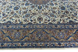 Corner detail of 2000s Kashmar rug showing border pattern and Wool pile