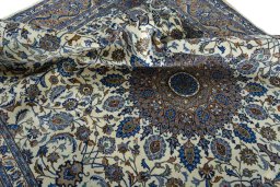 Surface texture of 2000s Kashmar rug with natural Wool and intricate pattern
