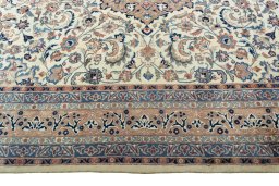 Corner detail of 1970s Kashmar rug showing border pattern and Wool pile