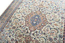 Backside of handmade 1970s Kashmar rug showing knot structure and weave density