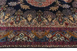 Corner detail of 2000s Kashmar rug showing border pattern and Wool pile