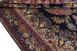 Close-up detail of 2000s Kashmar rug from Iran / Persia showing Wool weave