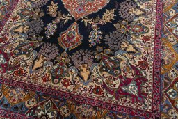 Close-up detail of 2000s Kashmar rug from Iran / Persia showing Wool weave