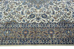 Corner detail of 2000s Kashmar rug showing border pattern and Wool pile