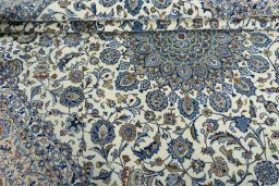 Close-up detail of 2000s Kashmar rug from Iran / Persia showing Wool weave