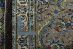 Backside of handmade 2000s Kashmar rug showing knot structure and weave density