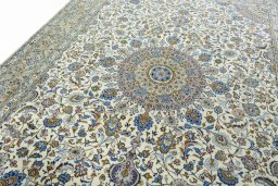 Backside of handmade 2000s Kashmar rug showing knot structure and weave density