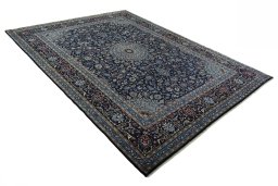 Close-up detail of New Kashmar rug from Iran / Persia showing Wool weave