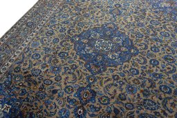 Backside of handmade 2000s Kashmar rug showing knot structure and weave density