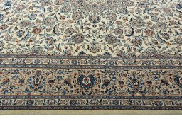 Corner detail of 2000s Kashmar rug showing border pattern and Wool pile
