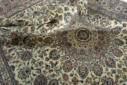 Surface texture of 2000s Kashmar rug with natural Wool and intricate pattern