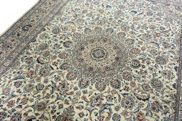 Backside of handmade 2000s Kashmar rug showing knot structure and weave density