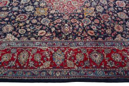 Corner detail of 2000s Kashmar rug showing border pattern and Wool pile