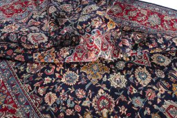 Surface texture of 2000s Kashmar rug with natural Wool and intricate pattern