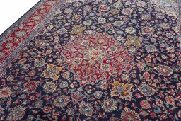 Backside of handmade 2000s Kashmar rug showing knot structure and weave density
