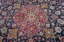 Central medallion detail of 2000s Kashmar rug from Iran / Persia