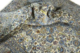 Surface texture of 2000s Kashmar rug with natural Wool and intricate pattern
