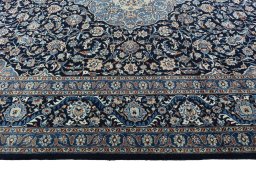 Corner detail of 2000s Kashmar rug showing border pattern and Wool pile