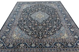 Surface texture of 2000s Kashmar rug with natural Wool and intricate pattern