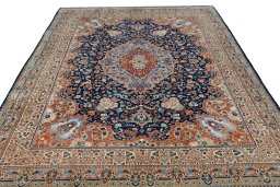 Surface texture of 1970s Kashmar rug with natural Wool and intricate pattern