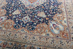 Close-up detail of 1970s Kashmar rug from Iran / Persia showing Wool weave