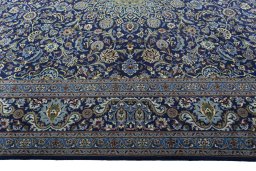 Corner detail of 2000s Kashmar rug showing border pattern and Wool pile