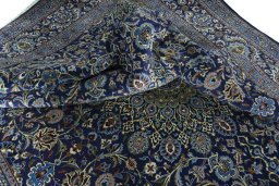 Surface texture of 2000s Kashmar rug with natural Wool and intricate pattern