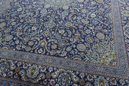 Close-up detail of 2000s Kashmar rug from Iran / Persia showing Wool weave