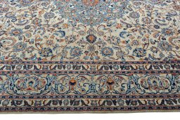 Corner detail of 2000s Kashmar rug showing border pattern and Wool pile
