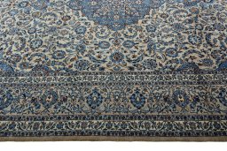 Corner detail of 2000s Kashmar rug showing border pattern and Wool pile
