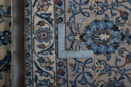 Backside of handmade 2000s Kashmar rug showing knot structure and weave density