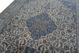 Backside of handmade 2000s Kashmar rug showing knot structure and weave density